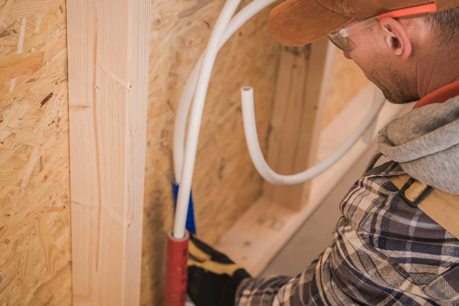 Plumber repairing the leakage ventilation system